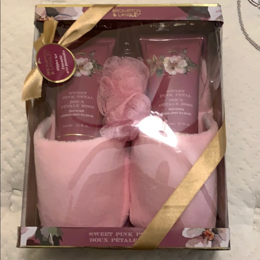 Pink slipper set with foot scrub and foot lotion